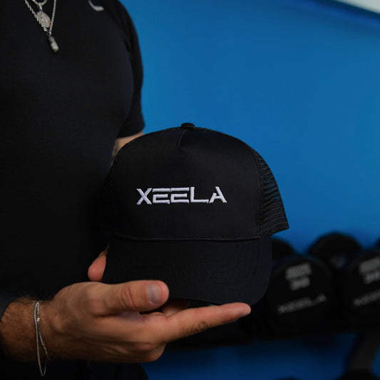 🎁 XEELA PREMIUM ATHLETIC HAT - BLACK W/ WHITE STITCHING (100% off)
